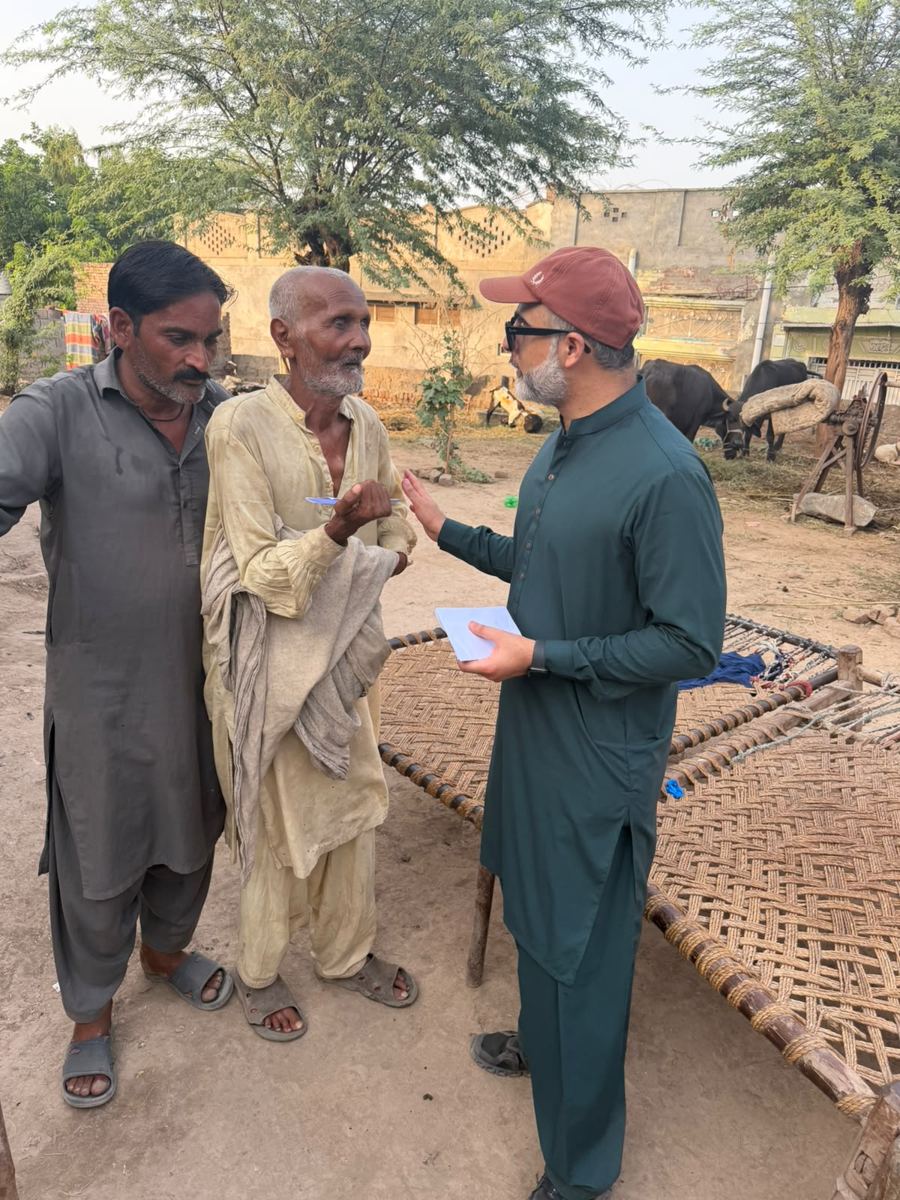 Volunteers on a field visit in a village